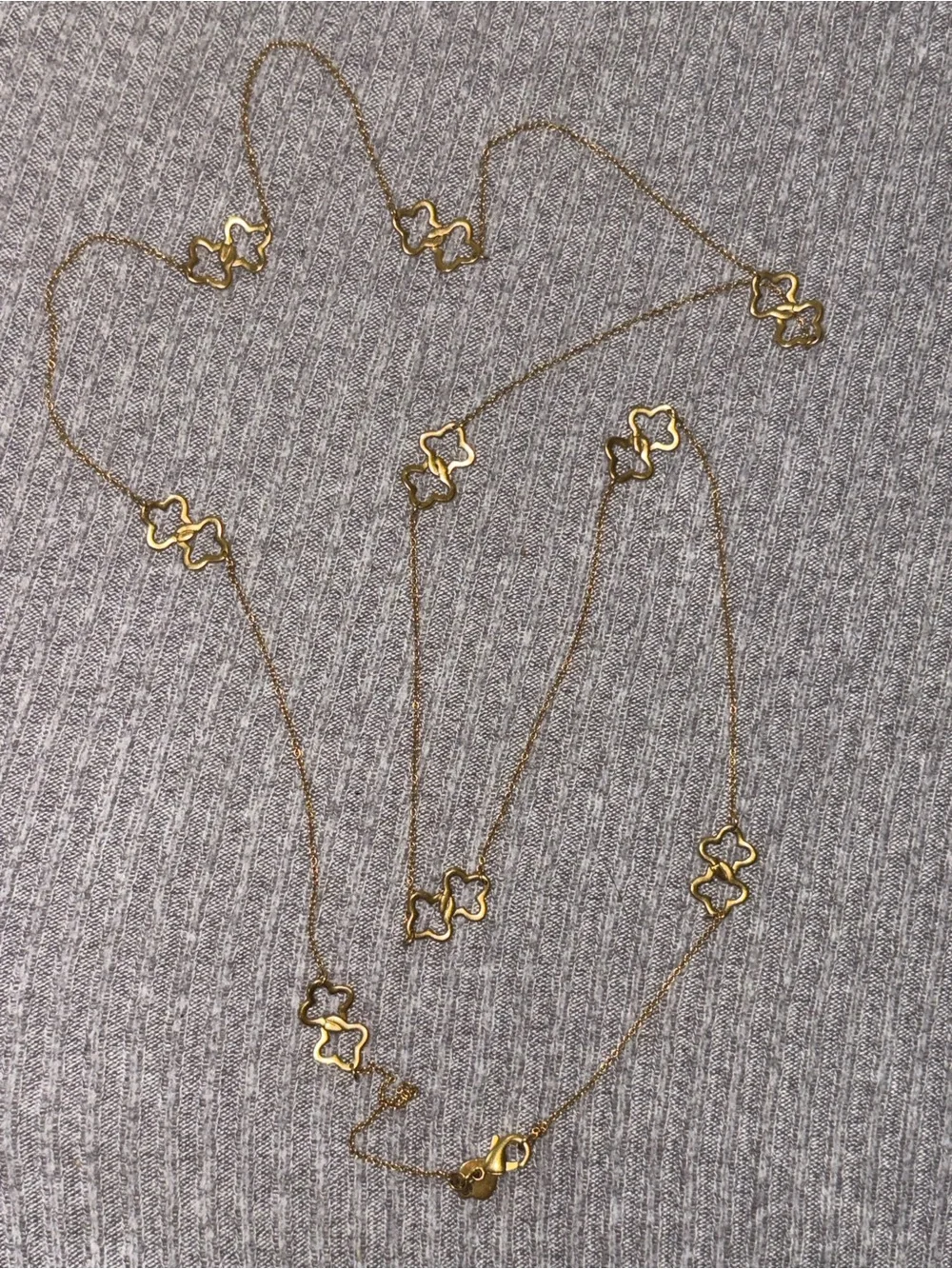 Vintage Stella & Dot marked gold tone intertwined clovers chain necklace
